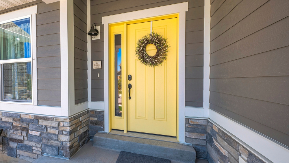 craftsman style door with sidelights